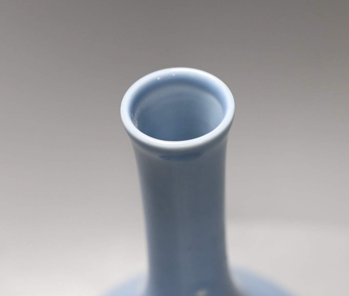 A Chinese claire du lune glazed bottle vase. 26cm tall